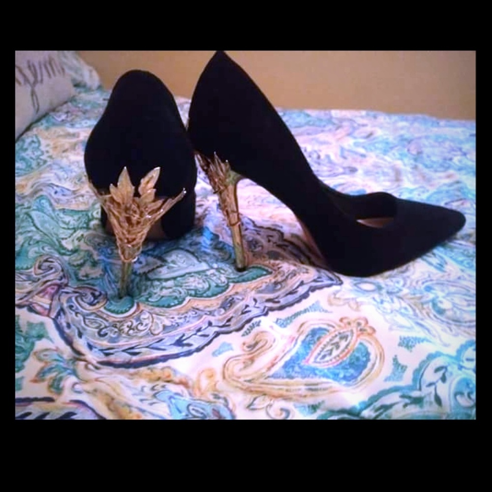 Black and gold high heels